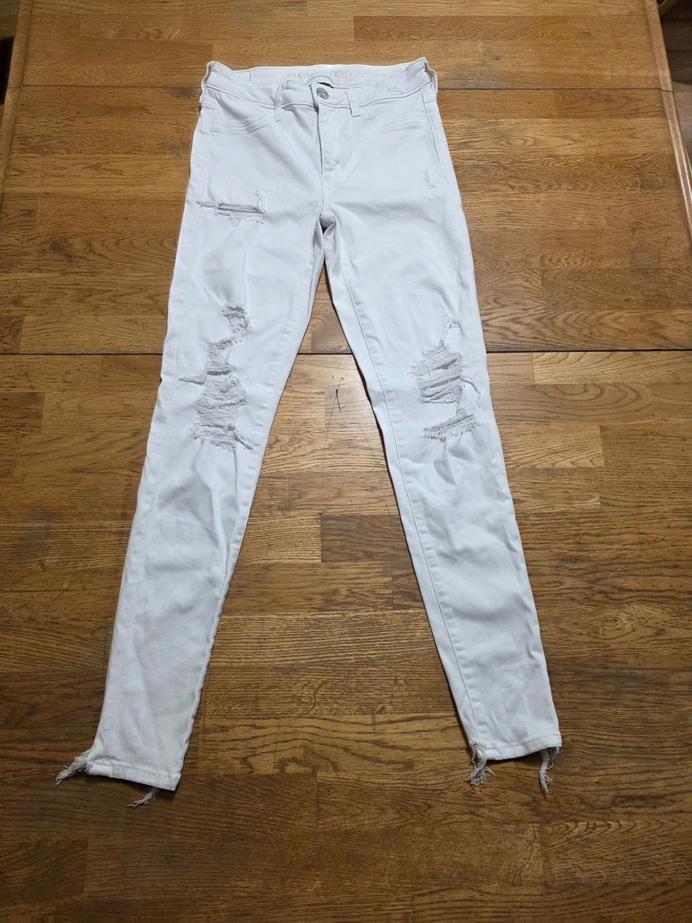 American Eagle Next Level Stretch Skinny Distressed Frayed White Jeans